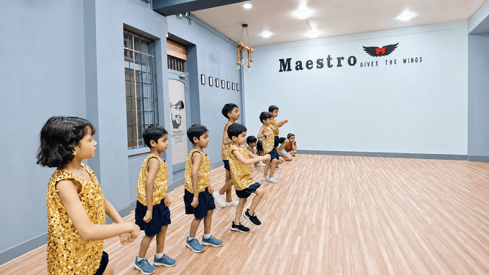 Kids batch rehearsing in gold costumes